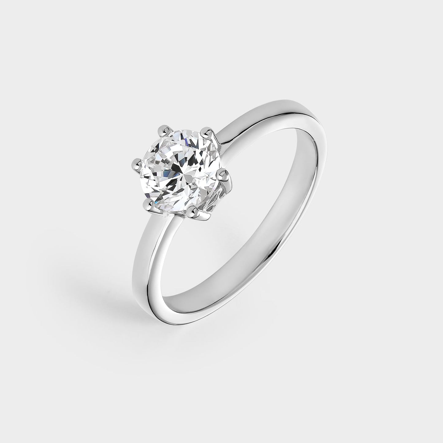 Anillo solitario de plata con circonita de 6,5 mm montada sobre 6 garras