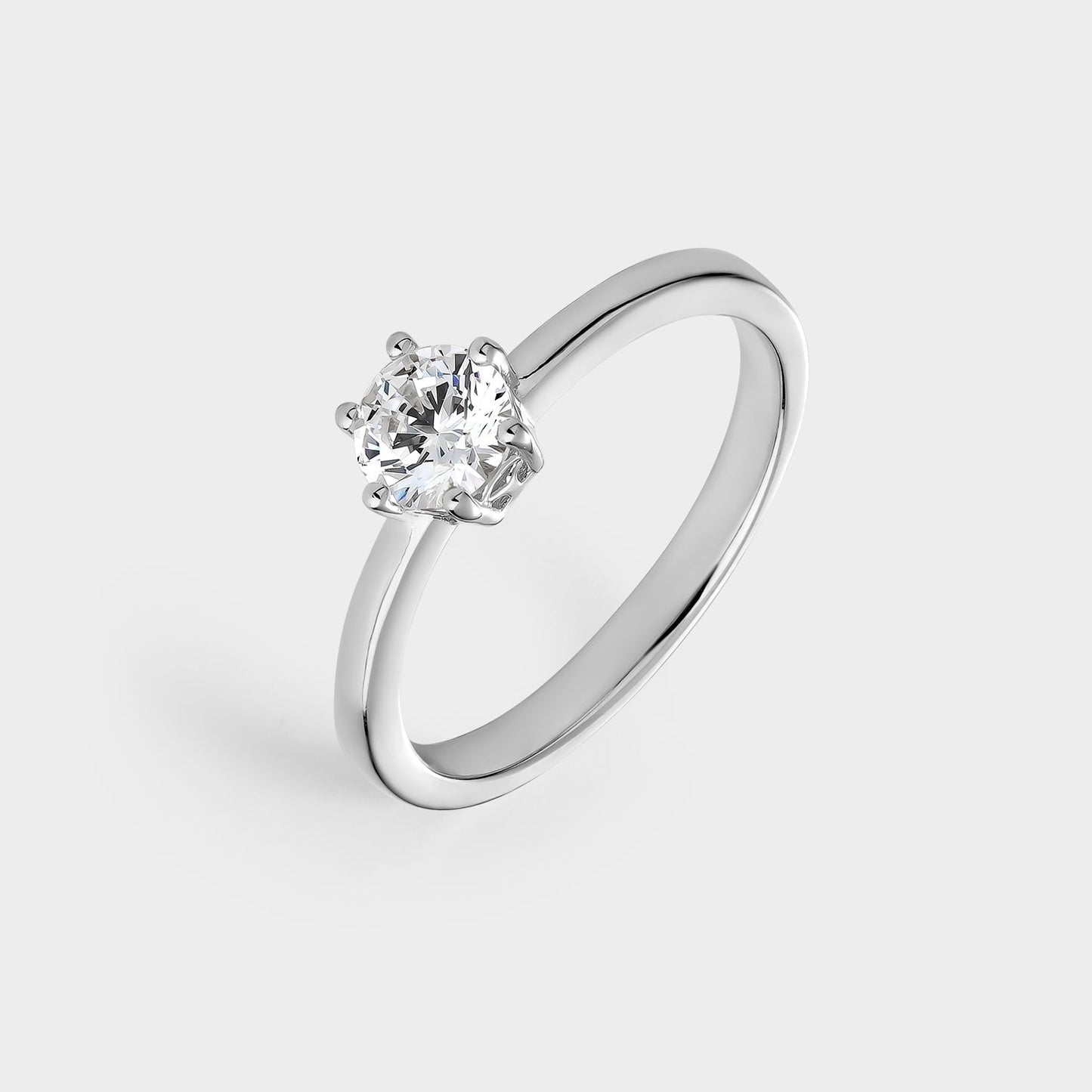 Anillo solitario de plata con circonita de 5,25 mm montada sobre 6 garras