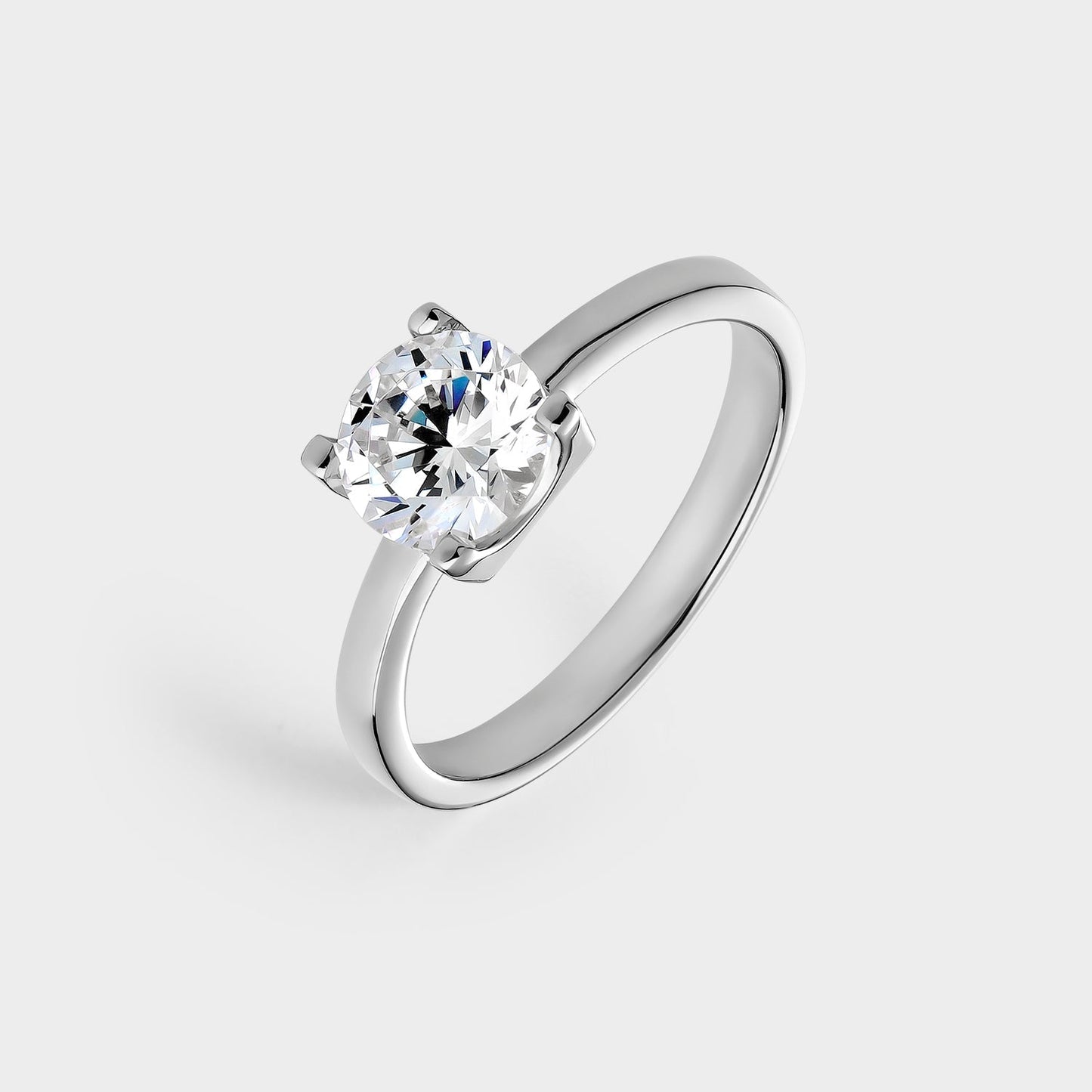Anillo solitario de plata con circonita de 7 mm montada sobre 4 garras