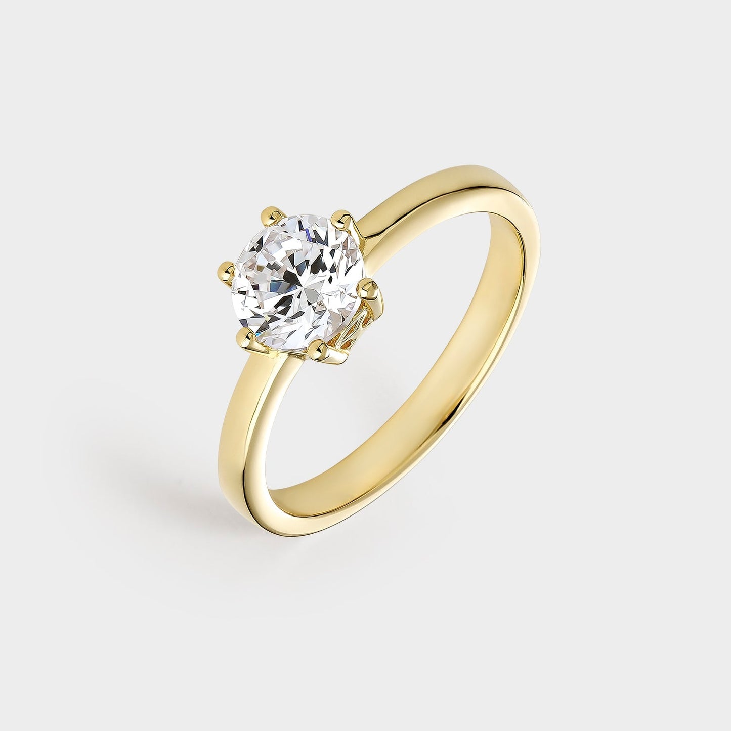 Anillo solitario de plata chapado en oro amarillo con circonita de 6,5 mm montada sobre 6 garras