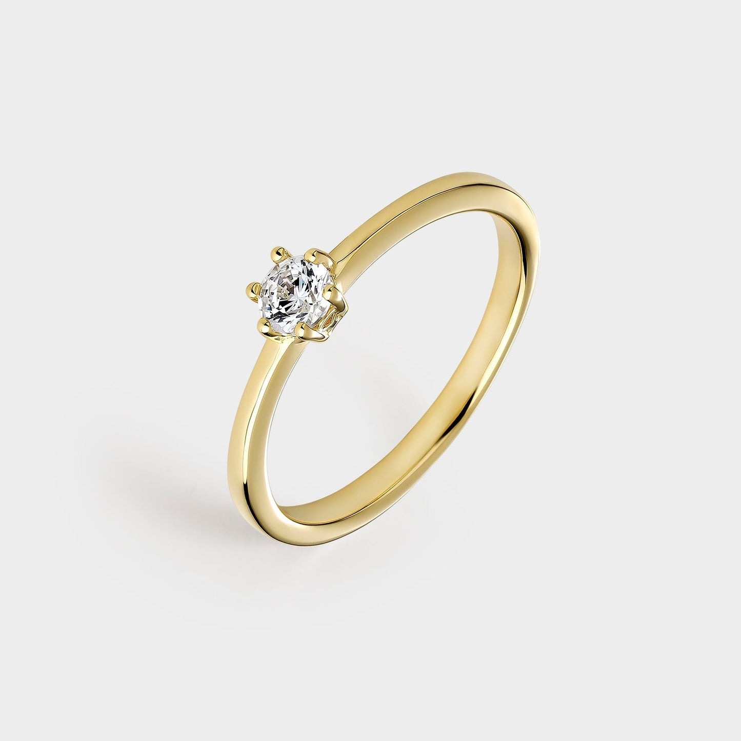 Anillo solitario de plata chapado en oro amarillo con circonita de 3,8 mm montada sobre 6 garras