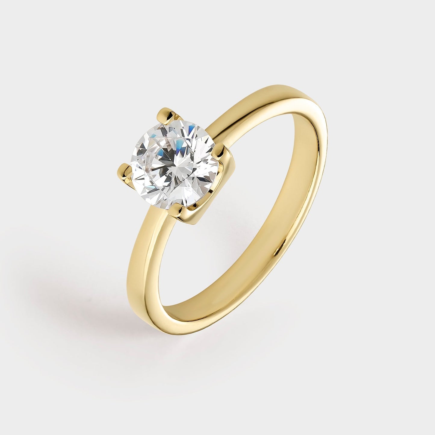 Anillo solitario de plata chapado en oro amarillo con circonita de 6,5 mm montada sobre 4 garras