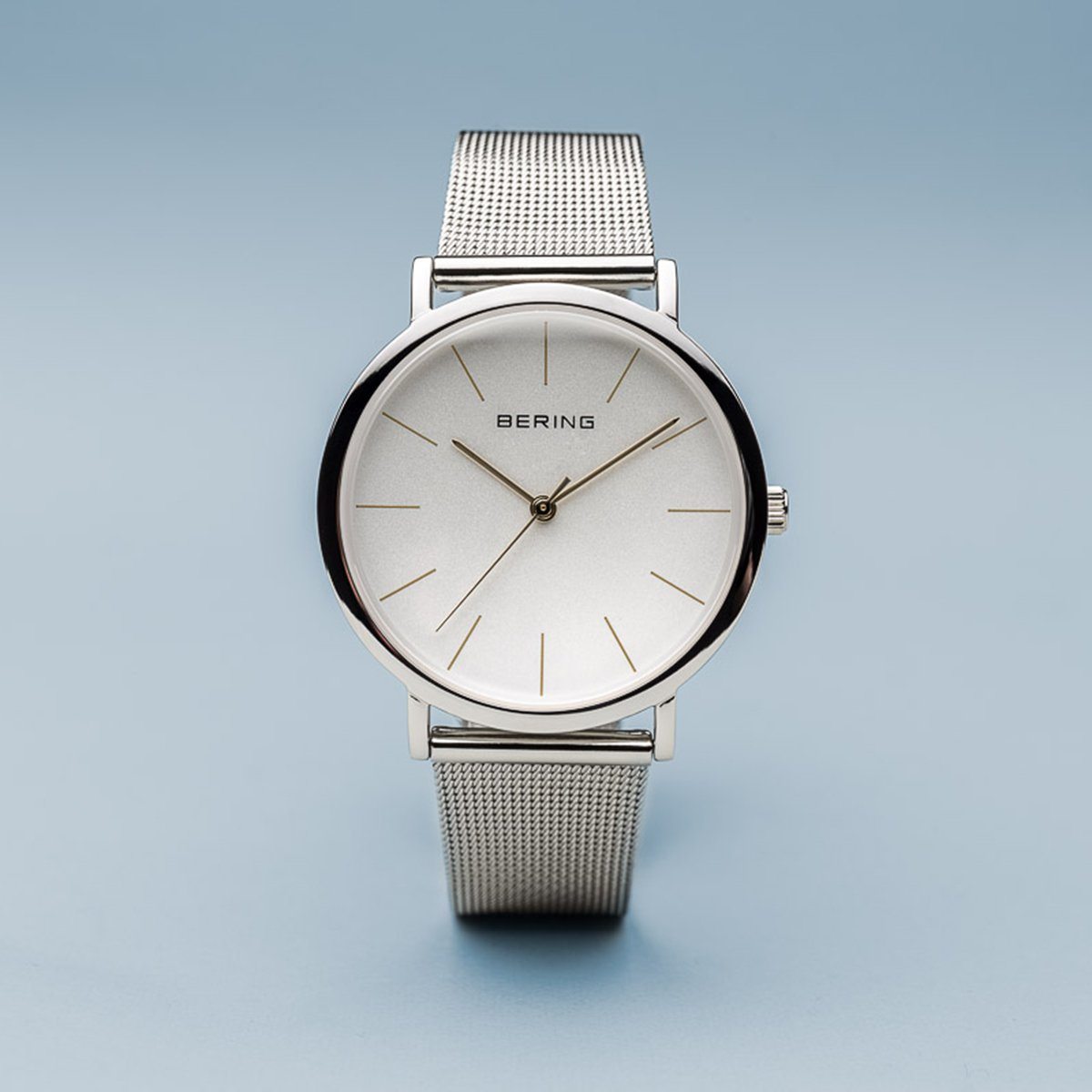 Reloj minimalista mujer plateado detalles dorados