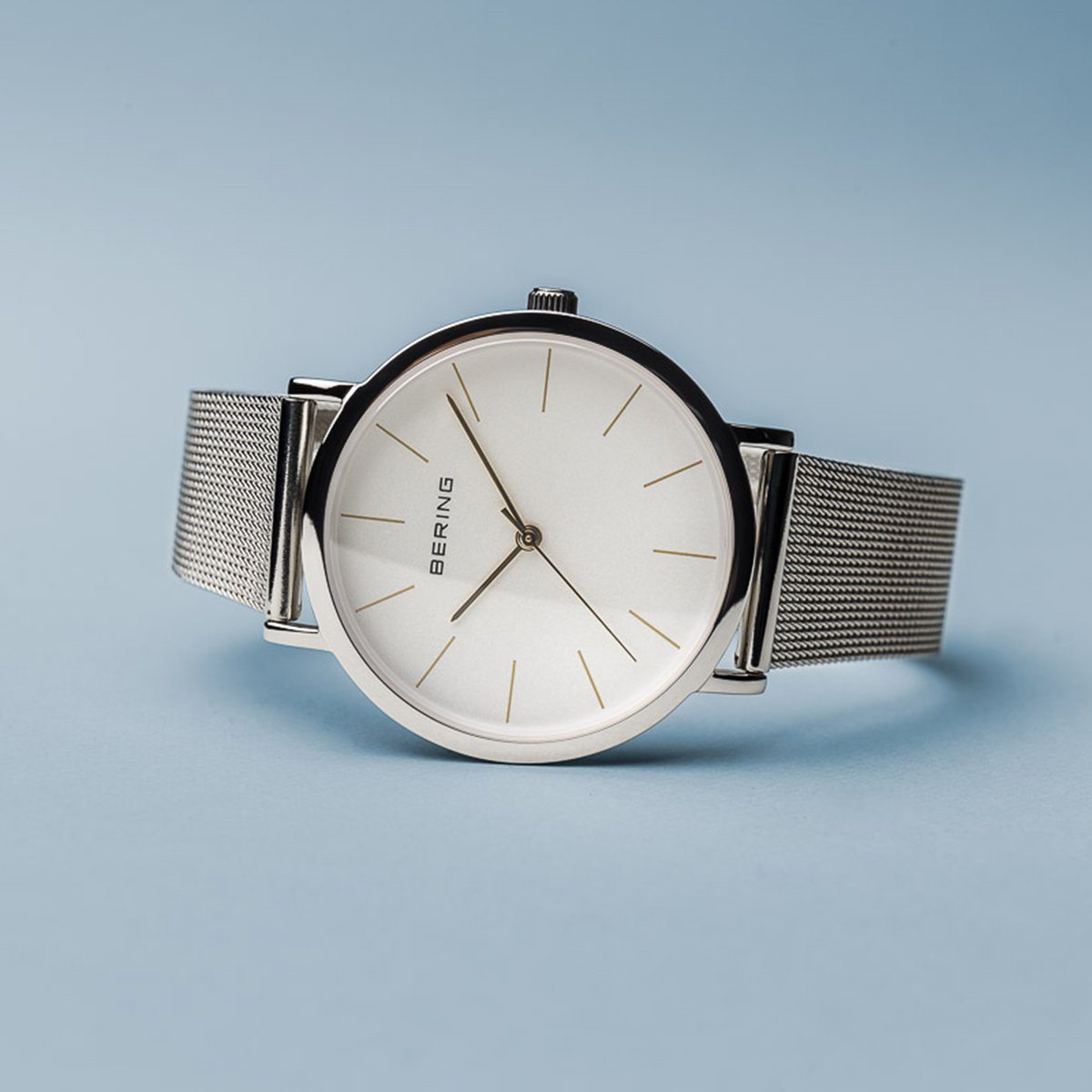 Reloj minimalista mujer plateado detalles dorados